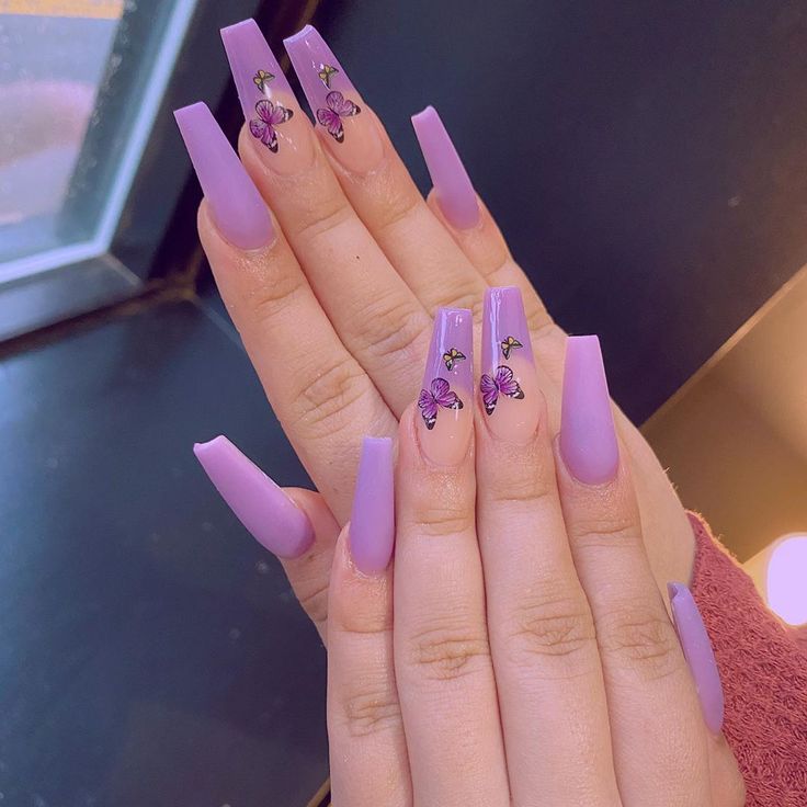 Elegant Lavender Acrylic Nails with Whimsical Butterfly Accents and Glossy Finish