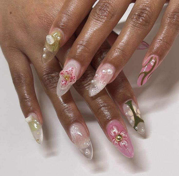 Elegant Pastel Floral Nail Design with Unique Embellishments for Spring Occasions