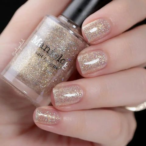 Glamorous Glittery Nude Nail Design for a Subtle Yet Striking Effect.