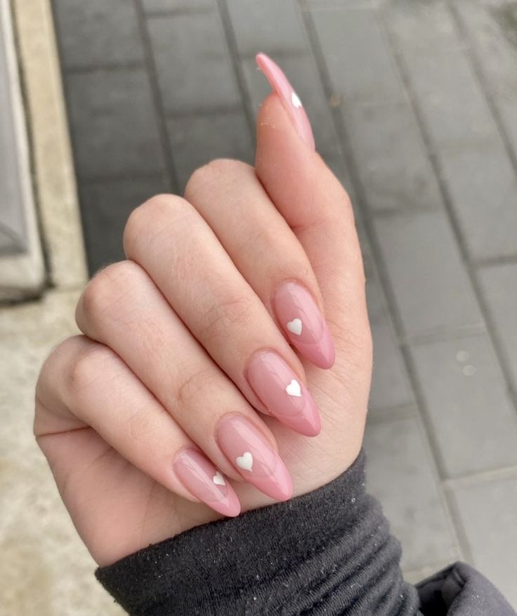 Charming Elegant Pink Nail Design with Heart Accents