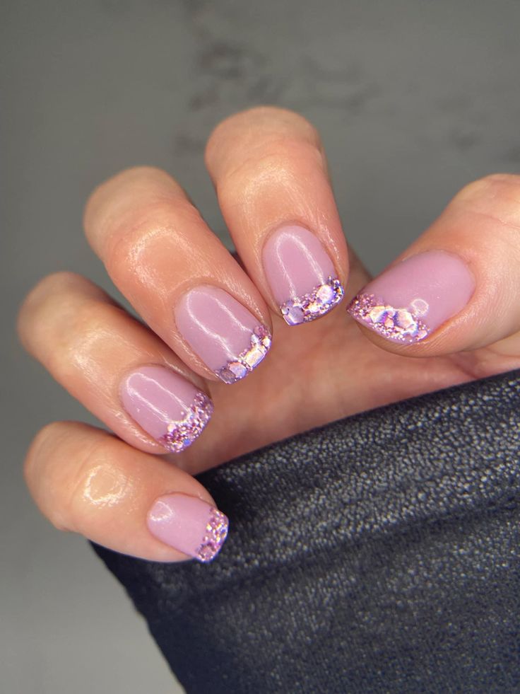 Sophisticated Lavender Nail Design with Glamorous Rhinestone Accents.