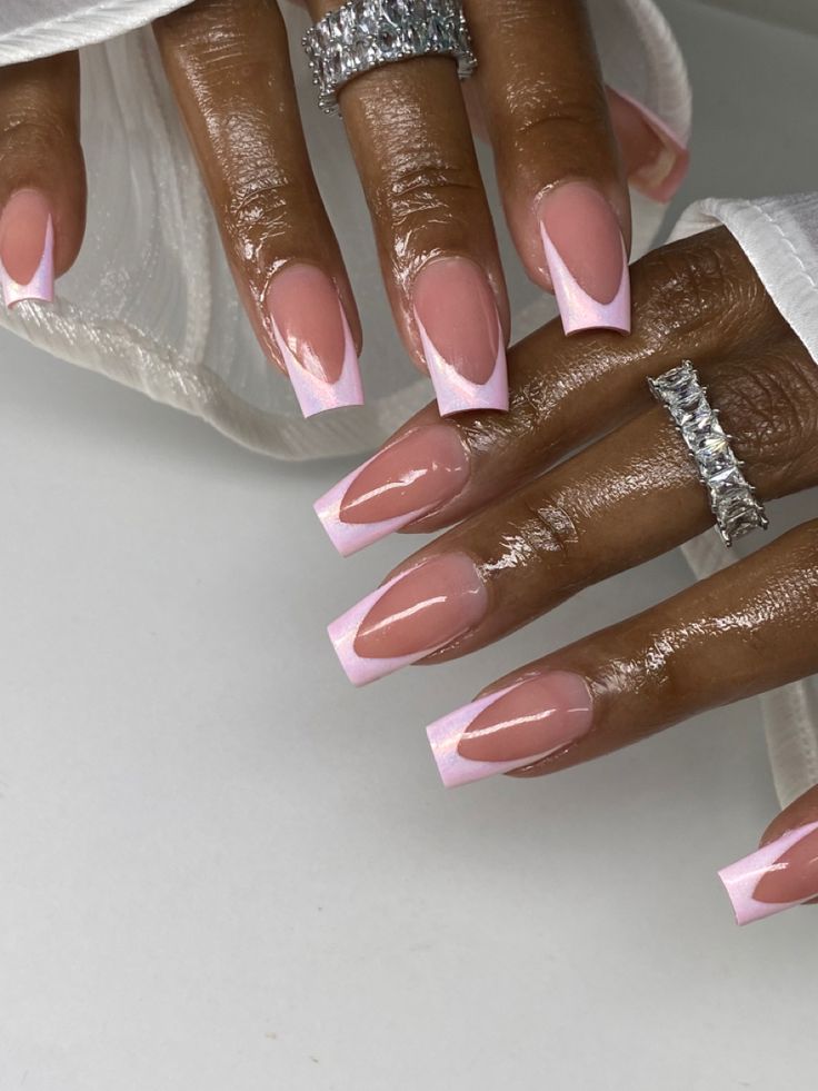 Trendy Sophisticated Nail Design: Soft Pink Base with Delicate White Tips