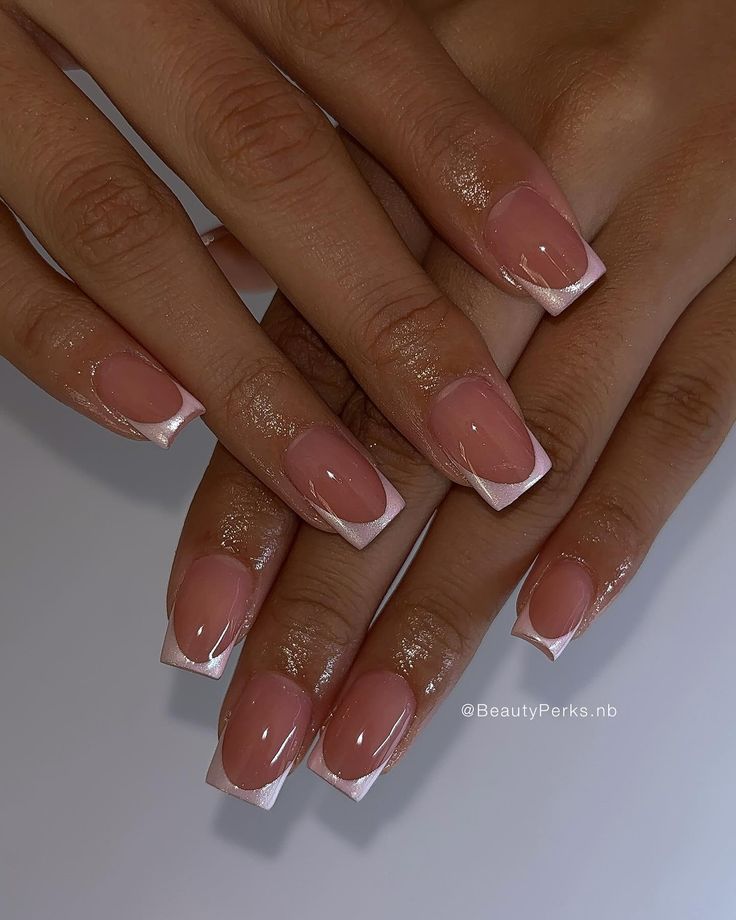 Sophisticated French Manicure with Glossy Nude Base and Crisp White Tips