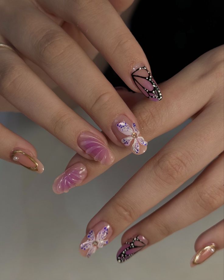 Whimsical and Elegant Colorful Nail Design with Butterfly and Floral Motifs