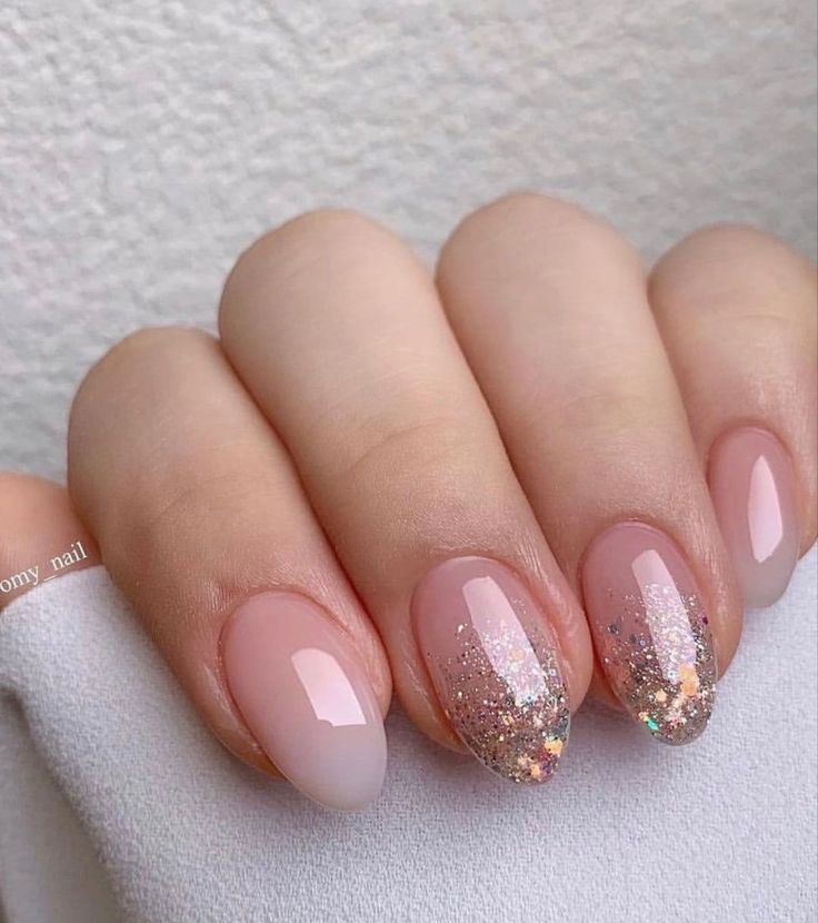 Chic Soft Pink Gradient Nail Design with Glamorous Glitter Finish