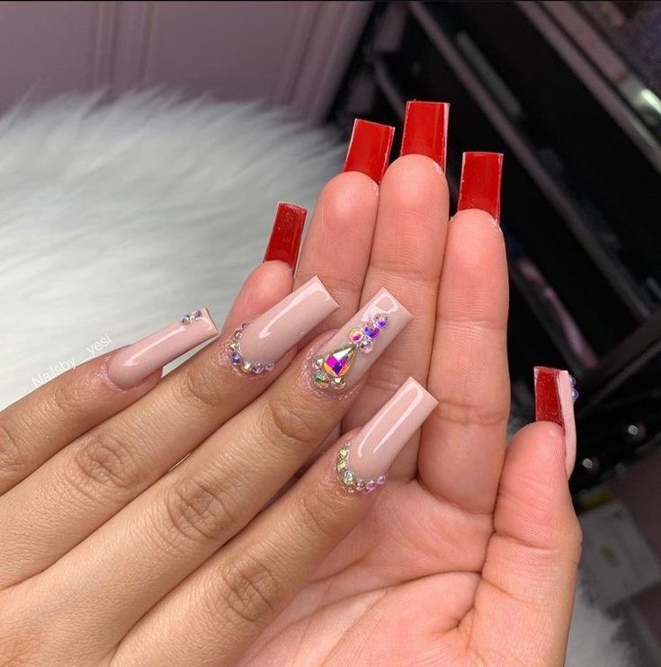 Bold Red and Pink Nail Design with Glamorous Rhinestones and Gems