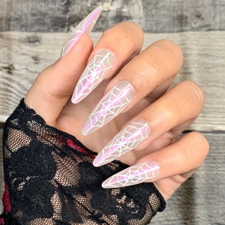 Ethereal Spiderweb Nail Art with Glossy Translucent Base for Chic Halloween Glam.