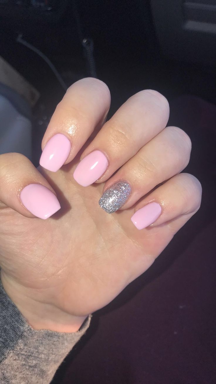 Chic Pastel Pink Manicure with Sparkling Accent Nail for Effortless Elegance.