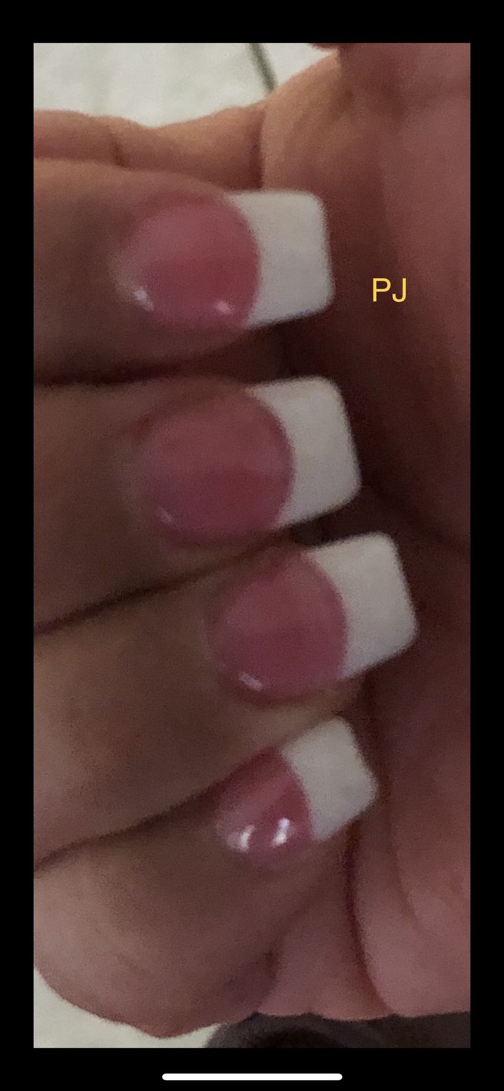 Timeless Elegant French Tips: Classic White Edges with Soft Pink Base for Any Occasion.