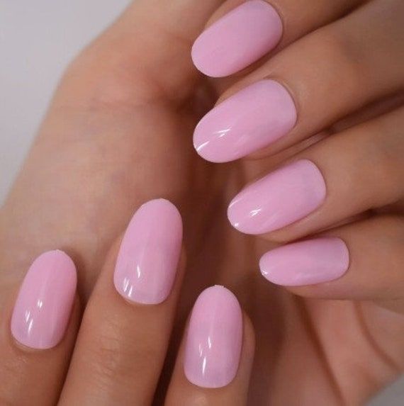 Chic Elegant Pink Manicure with Glossy Finish for Any Occasion.