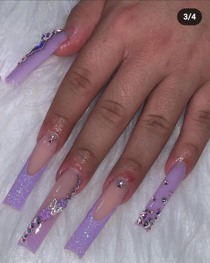 Chic Lavender and Pastel Acrylic Nail Design with Glitter and Rhinestones for Elegant Playfulness.