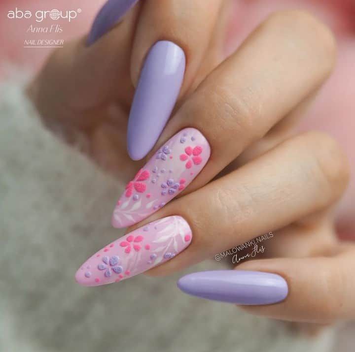 Elegant Floral Nail Design in Lavender and Pink with Intricate Patterns and Mixed Finishes.