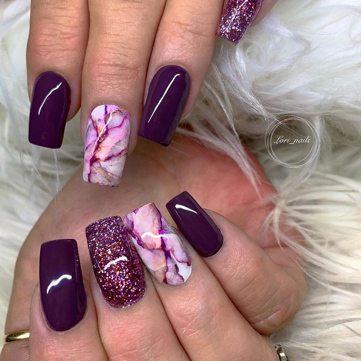 Chic Elegant Purple Nail Design with Textured Finishes and Sparkly Accents.