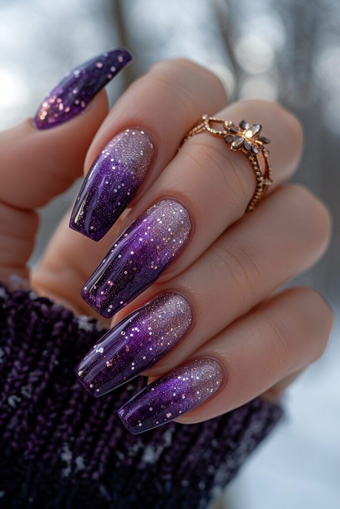 Elegant Ombre Purple Nail Design with Glitter Accents for Winter.