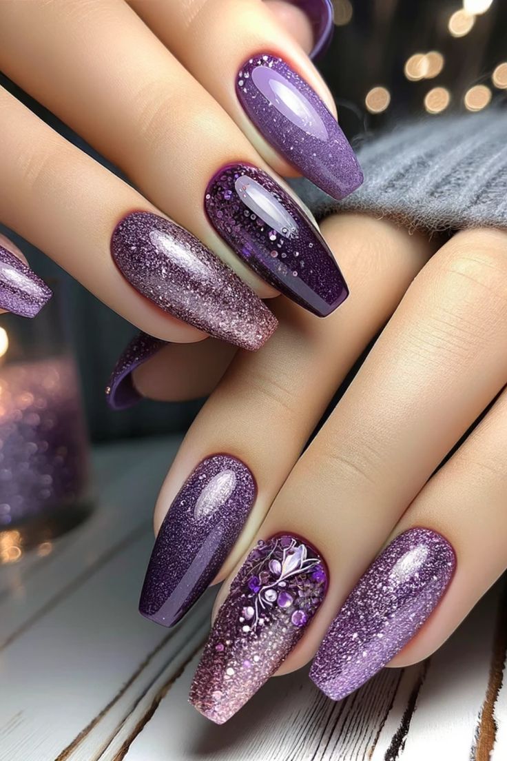 Elegant Purple Gradient Nail Design with Glitter and Embellishments