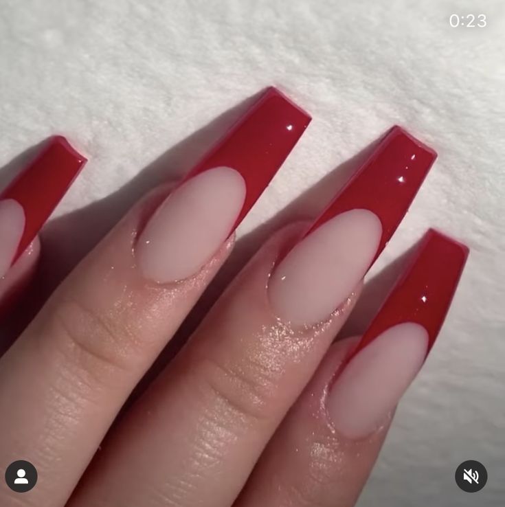 Chic Acrylic Manicure: Bold Red Tips with Elegant Nude Bases