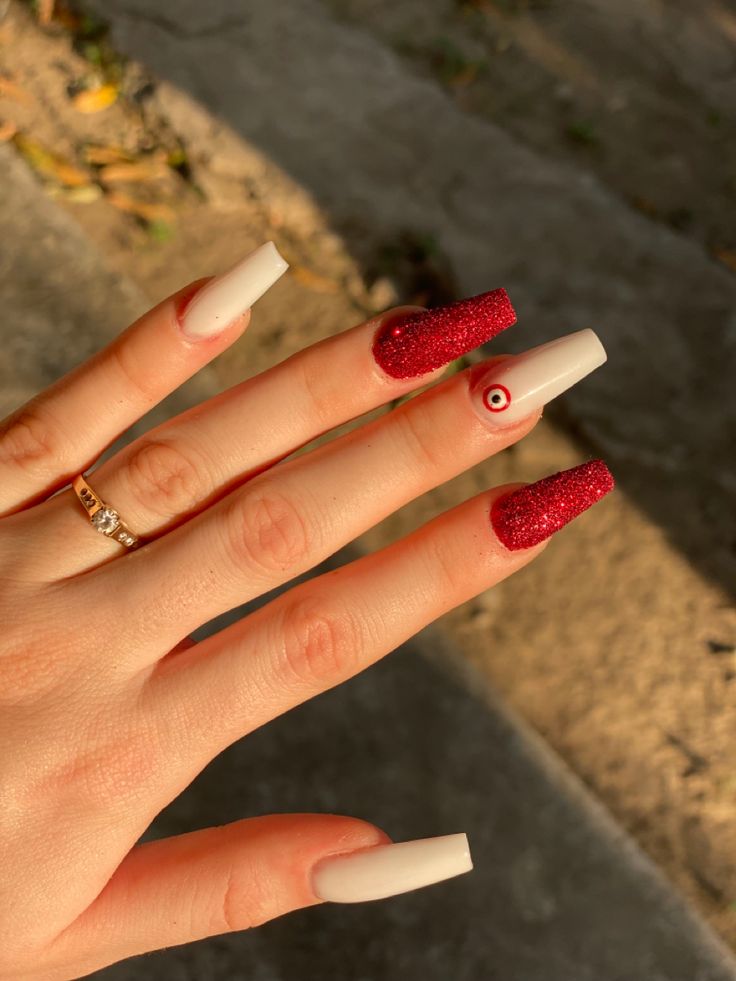 Chic Long Nails Featuring Bold Color Contrast and Whimsical Design Elements