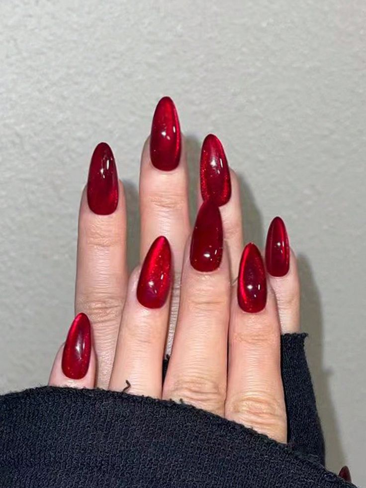 Bold and Elegant Almond-Shaped Glossy Red Nail Design for Luxurious Statements.