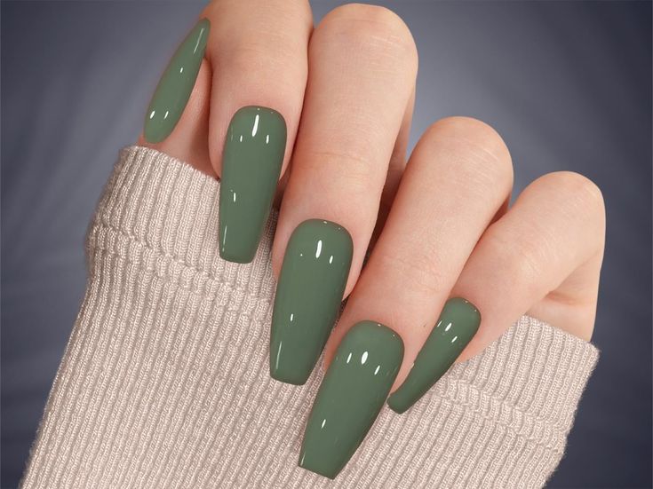 Trendy Chic: Elegant Soft Green Glossy Long Nails for Any Occasion