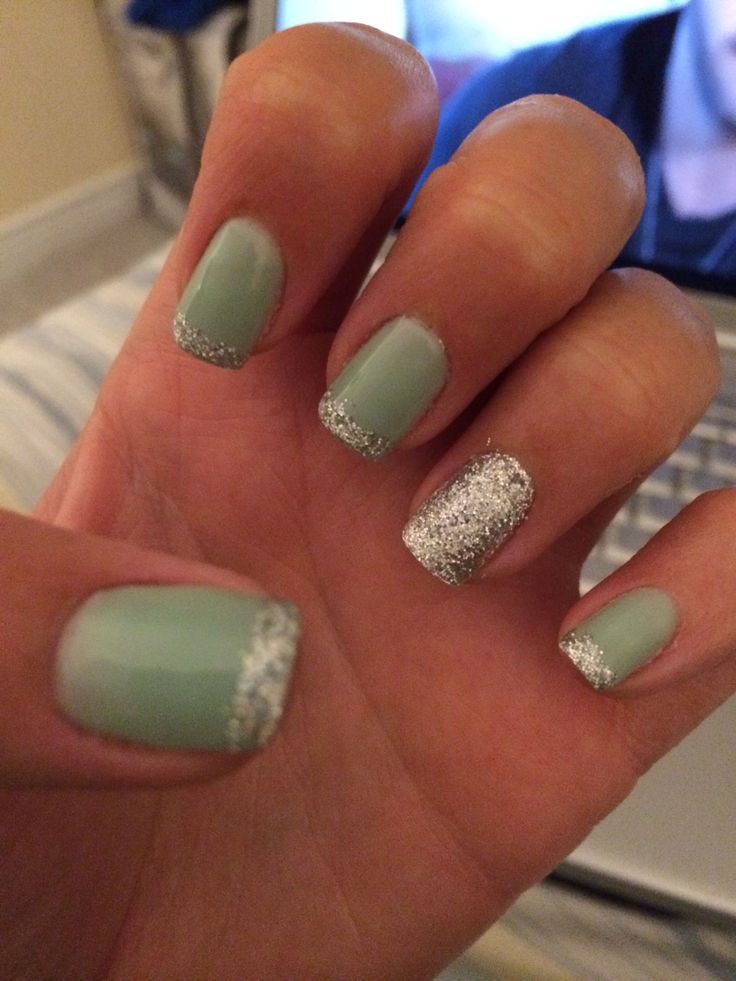 Glossy Mint Green Nail Design with Sparkling Silver Glitter Accent: A Fresh, Playful Elegance for Any Occasion