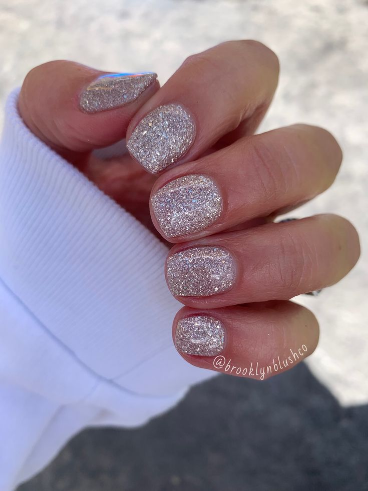 Glamorous Champagne Glitter Nail Design for Elegant Sophistication.