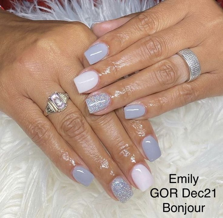 Sophisticated Gray and White Nail Design with Glittery Silver Accents