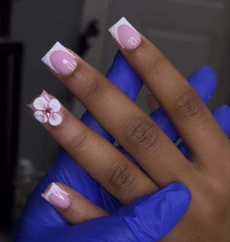 Elegant Soft Pink Floral Nail Design with 3D Flower Accent.