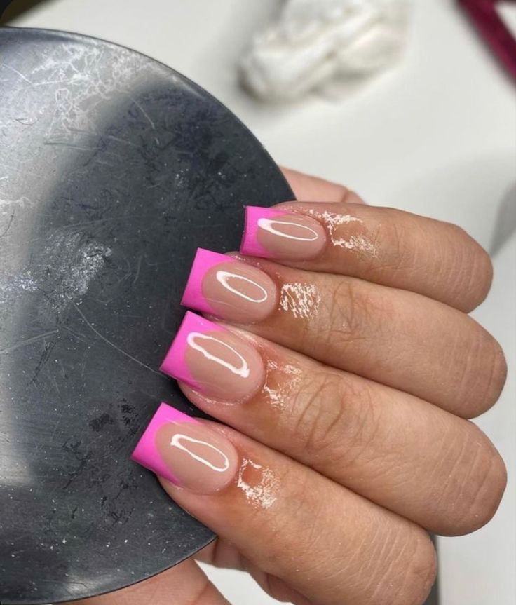 Bold Pink French Tip Nail Design: A Playful Take on Classic Style.