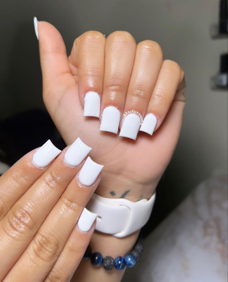 Elegant Glossy White Square Manicure: A Minimalist Chic Design.