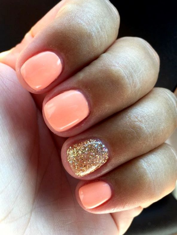 Charming Pastel Nail Design: Soft Peach with Dazzling Glitter Accent for Any Occasion