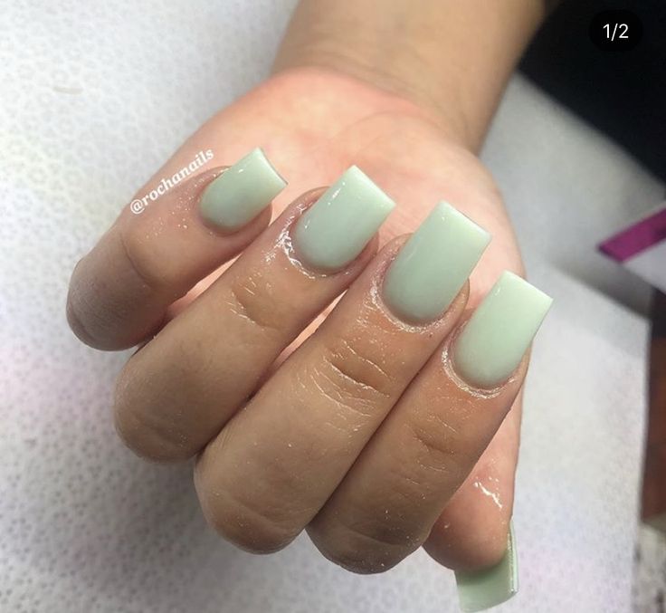 Modern Pastel Green Square Nails with Glossy Finish: Versatile for Any Occasion.