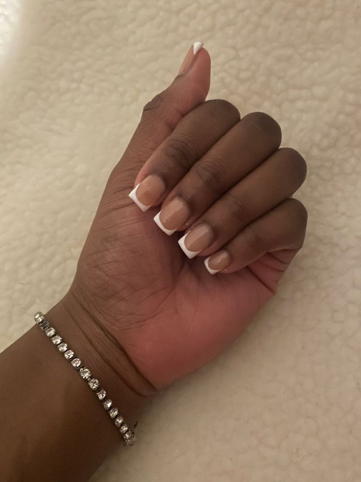 Timeless French Manicure: Classic White Tips on a Natural Base for Versatile Elegance