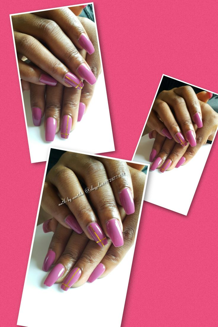 Chic Soft Pink Nail Design with Elegant Gold Accents for a Sophisticated Look.