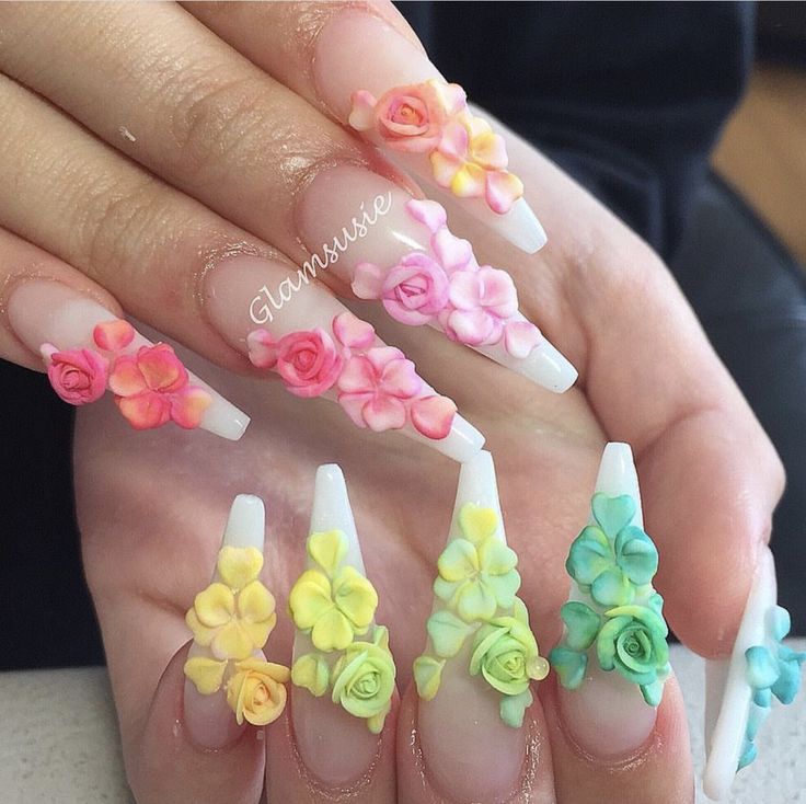 Vibrant Floral Nail Design with 3D Flowers Perfect for Spring Occasions.