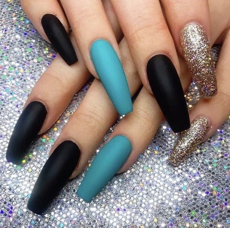 Elegant Chic Nail Design: Matte Black, Vibrant Teal, and Sparkling Gold Accents in Elongated Almond Shapes for Bold Statements.