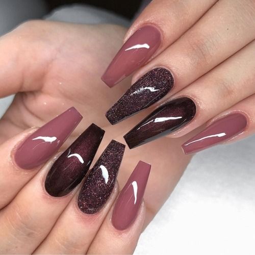 Sophisticated Nail Design: Deep Burgundy and Soft Mauve with Shiny Finishes and Glitter Accents.