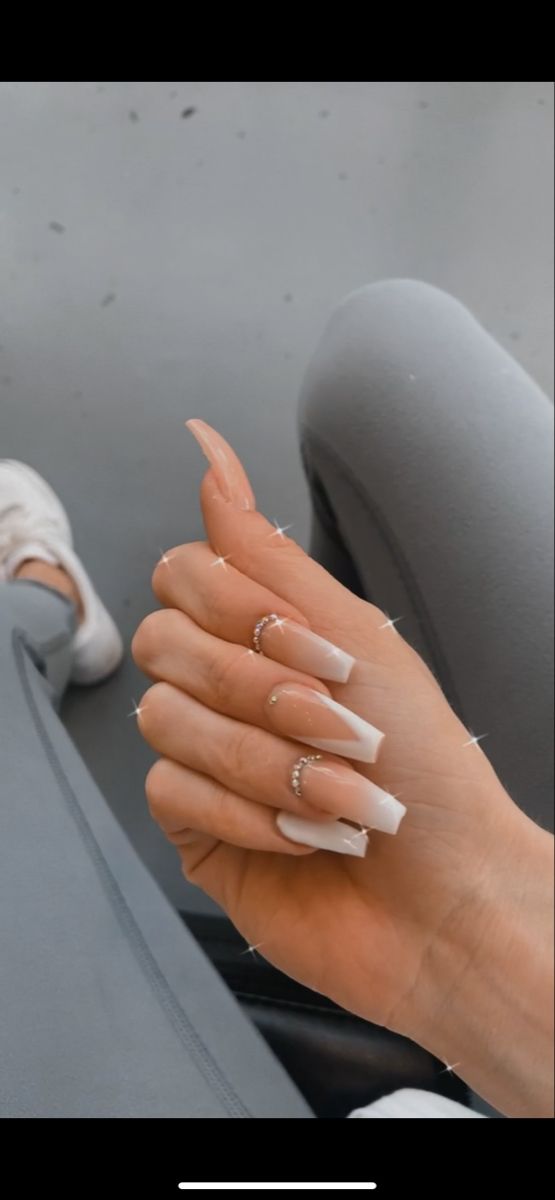 Chic Nude Square Nails with White Tips and Delicate Rhinestone Accents.