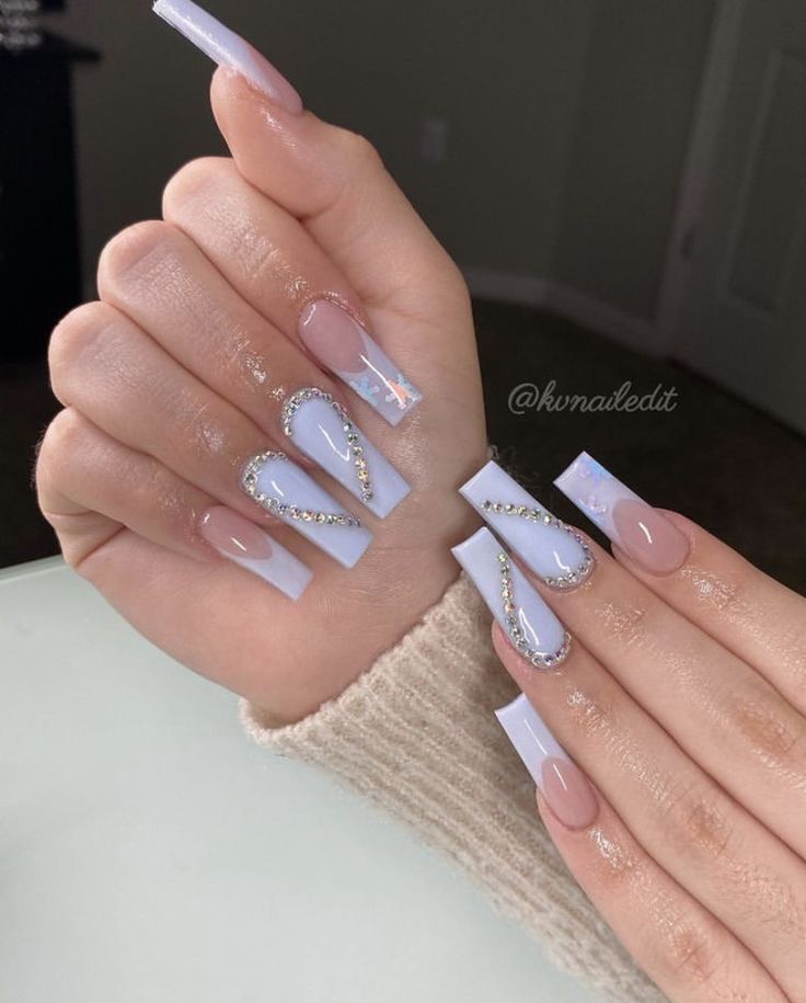 Chic Pastel Nail Art with Rhinestone Accents for a Modern Look.