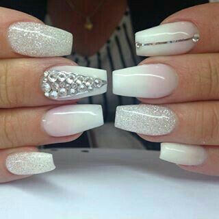 Sophisticated Elegant Nail Design with Glossy White and Shimmering Silver Accents