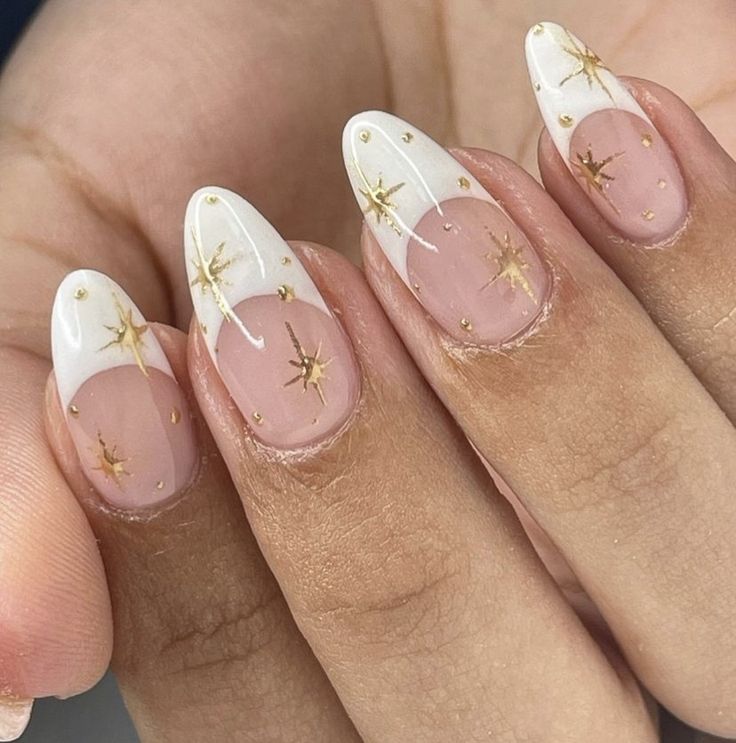 Elegant Almond-Shaped Nails with French Tips and Glamorous Gold Accents