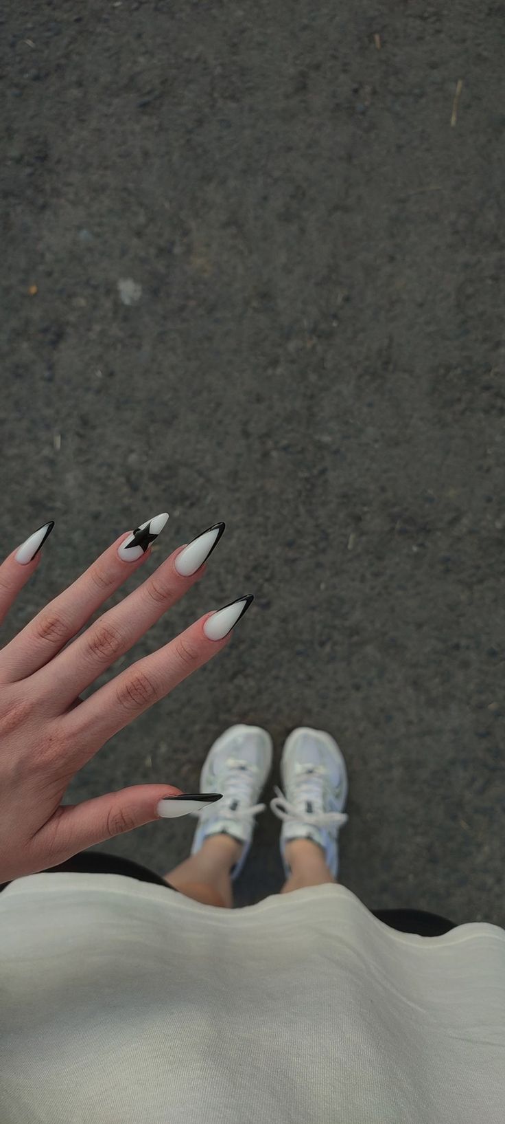 Bold Black and White Elongated Nail Design for a Stylish Statement.