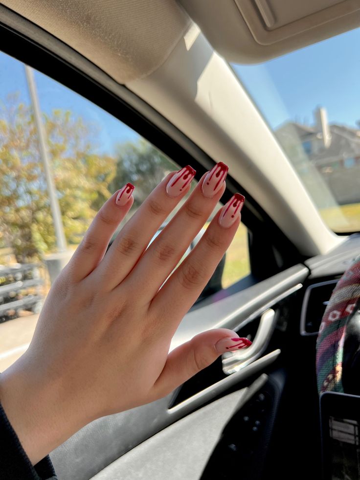 Bold Pink and Red Drip Nail Design: A Playful Statement of Individuality.