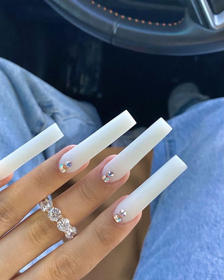 Chic Long Matte White Nails with Rhinestones for a Bold, Sophisticated Look