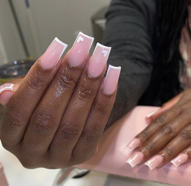 Chic French Tip Nail Design with Soft Pink Base and Glossy Finish