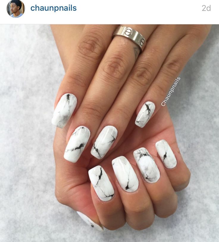 Chic Marble Nail Design: Striking White and Black Elegance