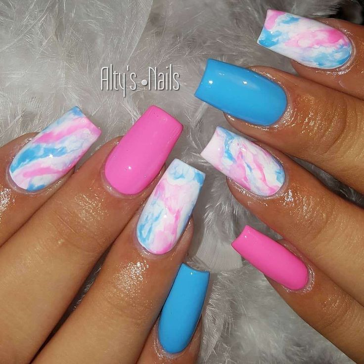 Vibrant Pink and Blue Marble Nail Design: A Stylish Twist for Any Outfit.