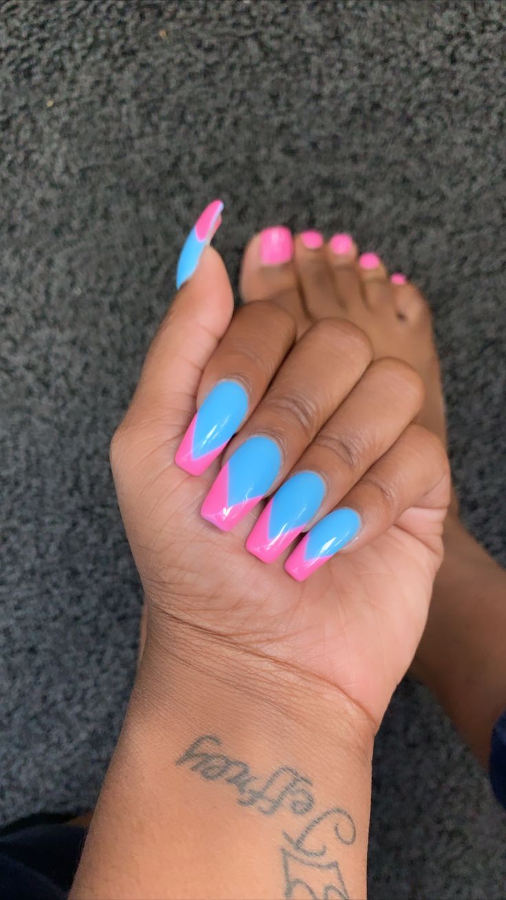 Playful Geometric Nail Design: A Fresh Blue and Pink Expression of Creativity.