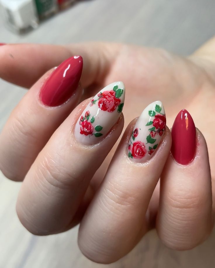 Vibrant Red Rose Nail Design on Soft White: A Feminine Touch of Elegance.