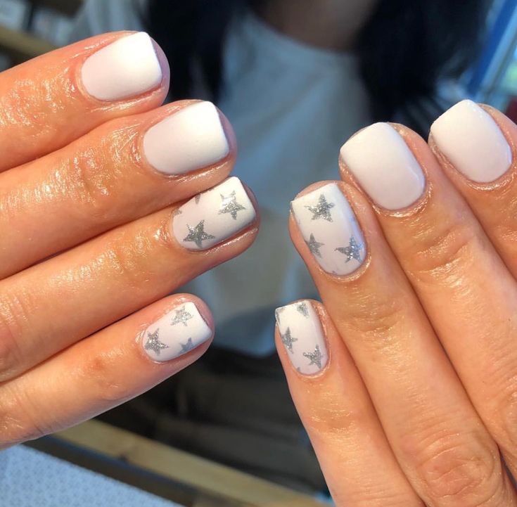 Whimsical Pastel Nail Design: Matte and Glossy Elegance with Star Motifs