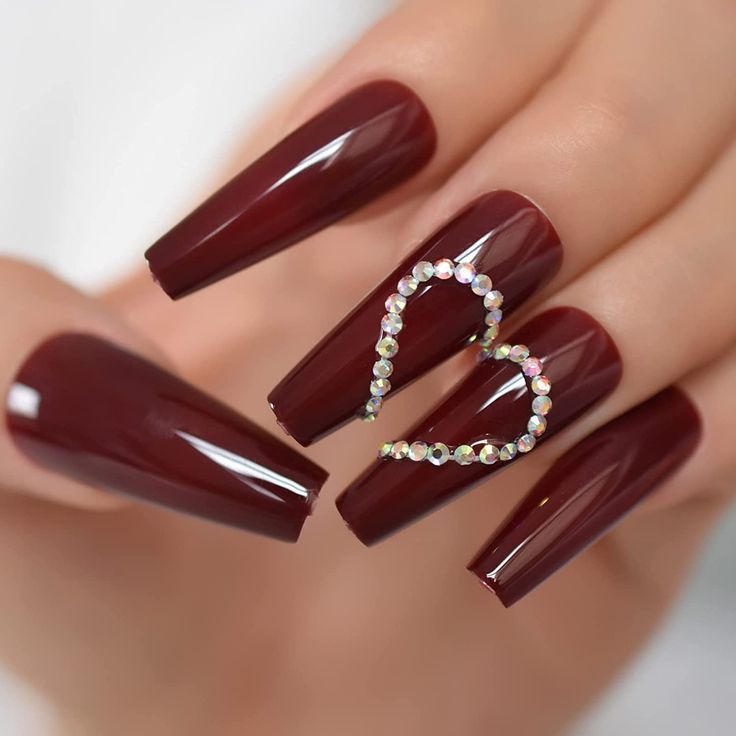 Elegant Bold Burgundy Nails with Rhinestone Heart: A Chic Statement Design.